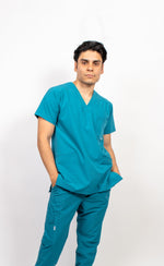 SCRUB REVOLT JOGGER ANTIFLUIDOS COLECCIÓN BOSQUE