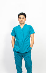 SCRUB REVOLT JOGGER ANTIFLUIDOS COLECCIÓN BOSQUE