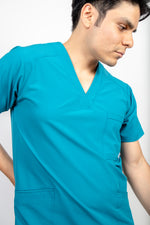 SCRUB REVOLT JOGGER ANTIFLUIDOS COLECCIÓN BOSQUE