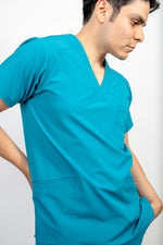 SCRUB REVOLT JOGGER ANTIFLUIDOS COLECCIÓN BOSQUE